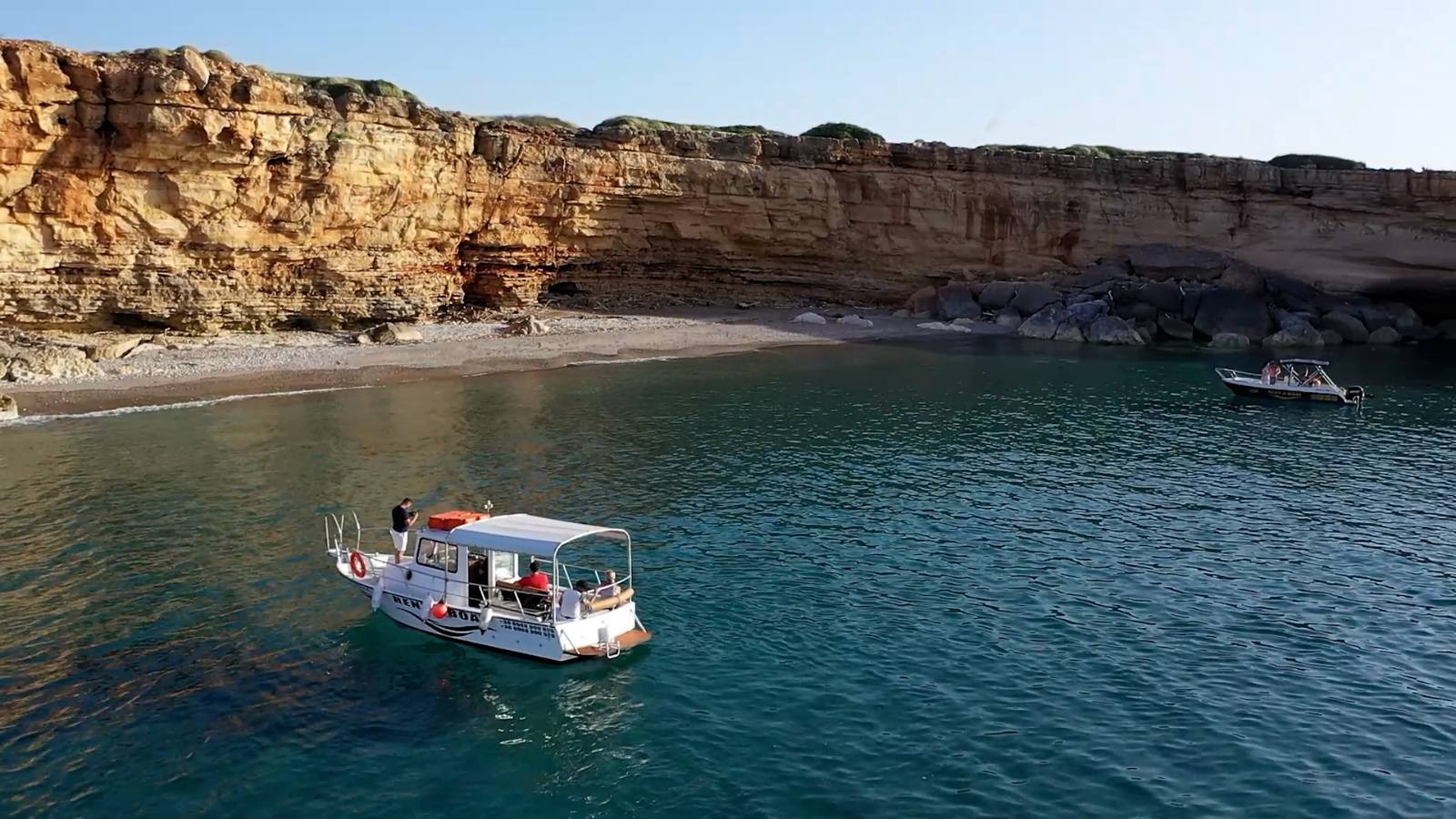 Morning fishing trip boat in a Cretan bay